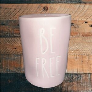 BE FREE Pink Ceramic Jar by Magenta Company.